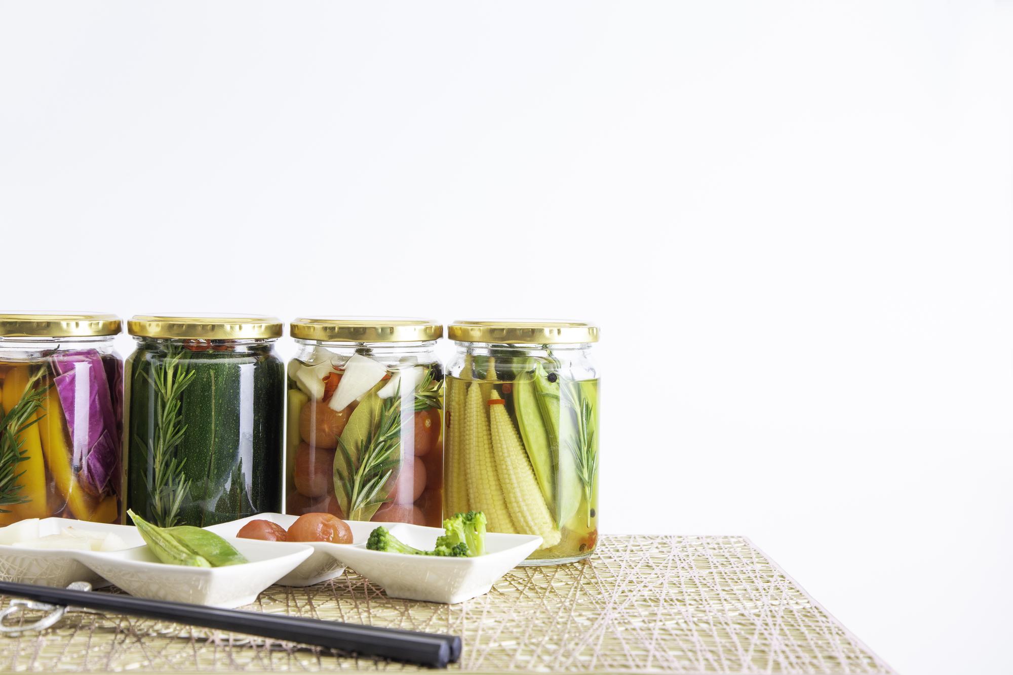 Tray of seasonal preserves in jars
